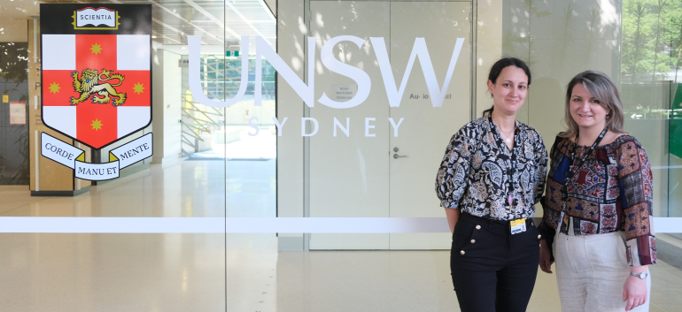 Irina and Irene with UNSW logo 