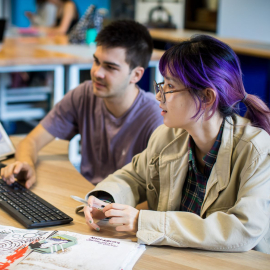 Design students working on computer