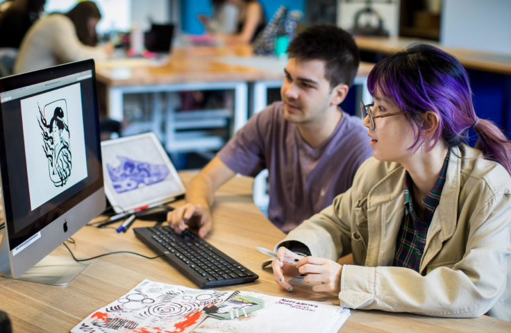 Design students working on computer